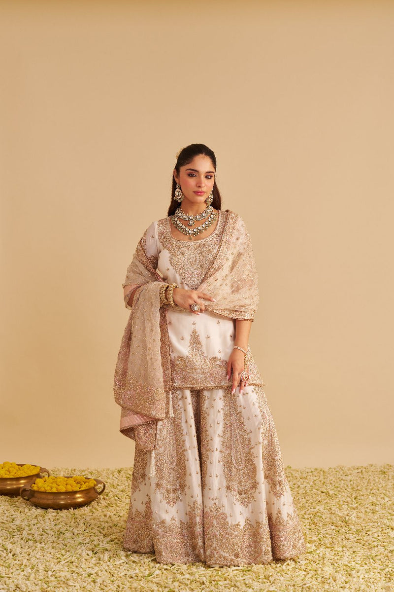 Alina - Dabka Zardozi Embroidered Silk Daisy Ivory Sharara Set silk by SHEETAL BATRA in ivory color for women Worldwide