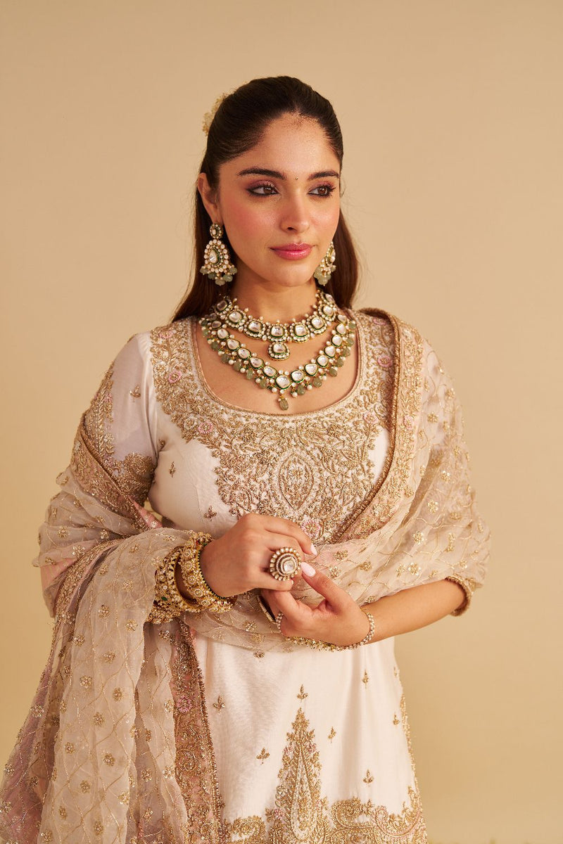 Alina - Dabka Zardozi Embroidered Silk Daisy Ivory Sharara Set silk by SHEETAL BATRA in ivory color for women Worldwide