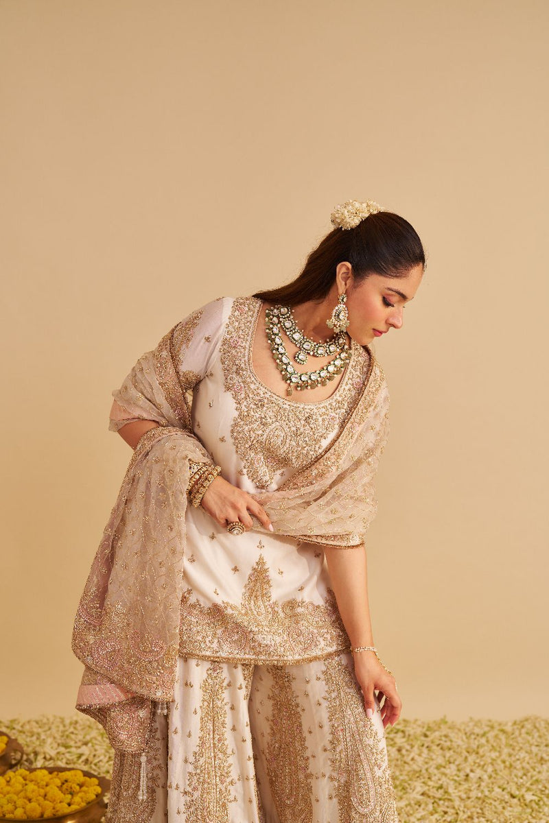 Alina - Dabka Zardozi Embroidered Silk Daisy Ivory Sharara Set silk by SHEETAL BATRA in ivory color for women Worldwide