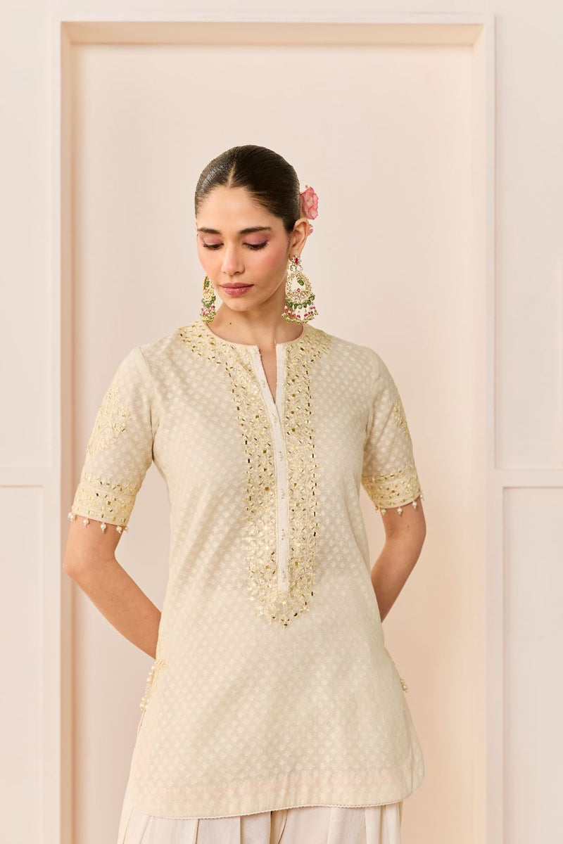 ANAISHA -DAISY IVORY SHORT KURTA WITH FARSHI SALWAR chanderi silk kurta/kurta set by SHEETAL BATRA in daisy ivory with carnation pink for women Worldwide