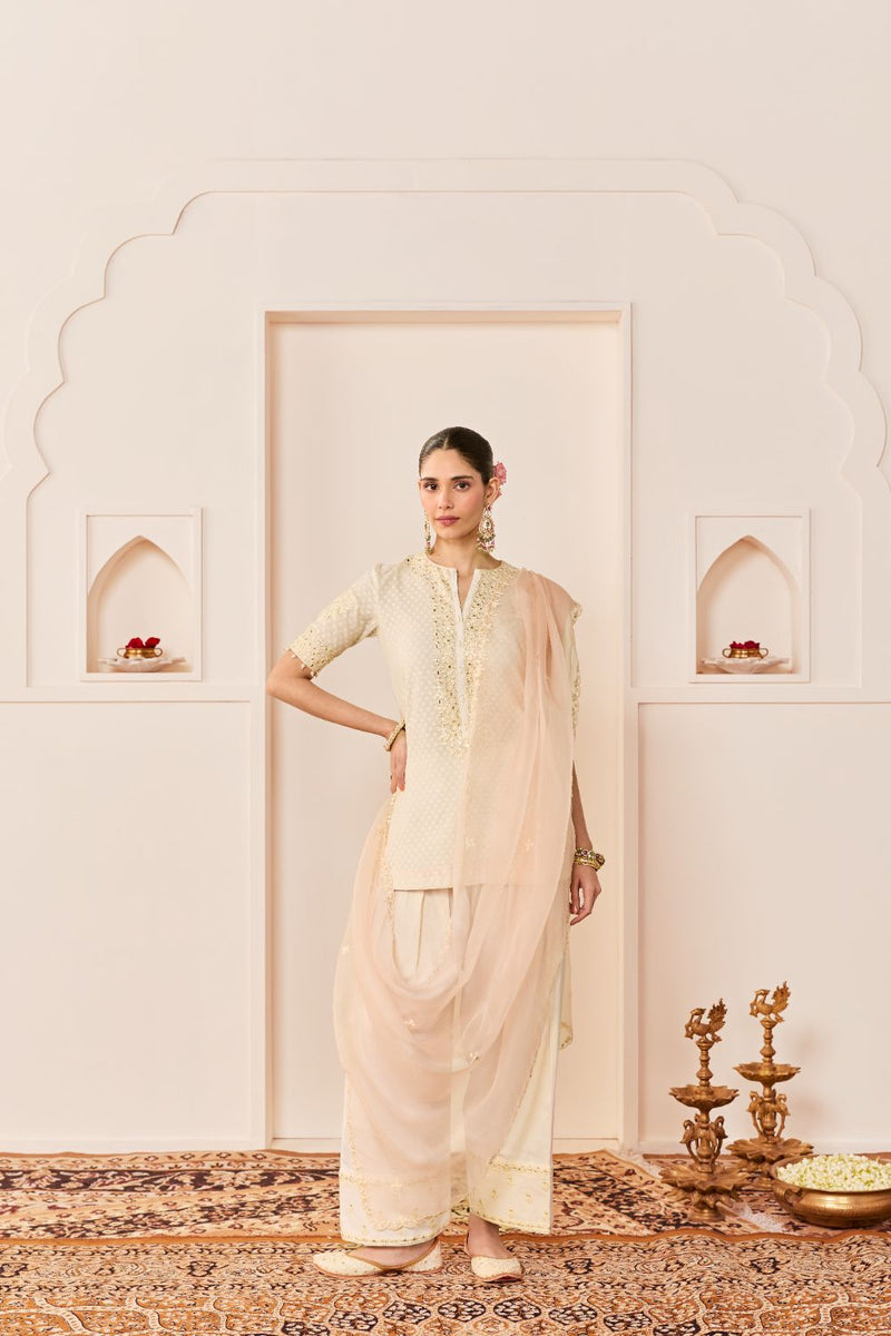 ANAISHA -DAISY IVORY SHORT KURTA WITH FARSHI SALWAR chanderi silk kurta/kurta set by SHEETAL BATRA in daisy ivory with carnation pink for women Worldwide