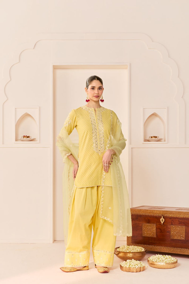 ANAISHA - LEMON YELLOW SHORT KURTA WITH FARSHI SALWAR chanderi silk kurta/kurta set by SHEETAL BATRA in lemon yellow with mint green for women Worldwide