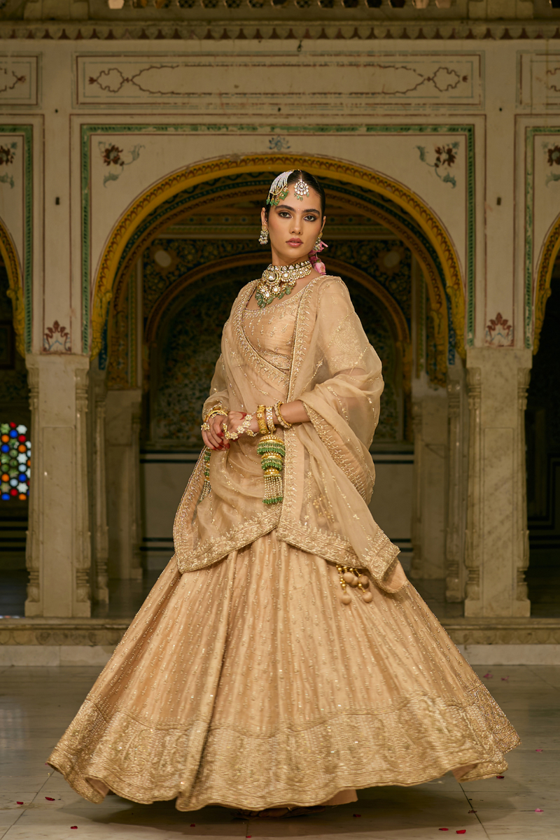 Aaliya - Dabka Zardozi Embroidered Raw Silk Gold Lehenga Set silk by SHEETAL BATRA in gold color for women Worldwide