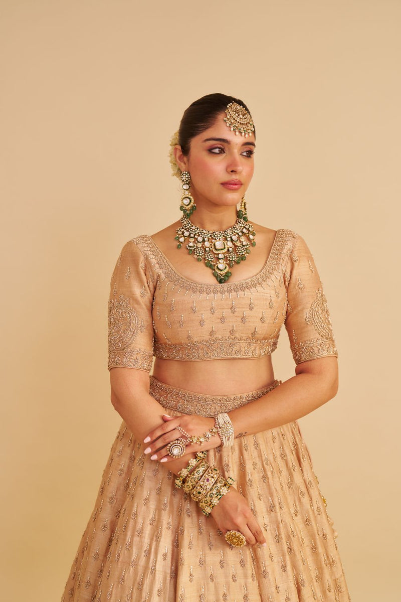 Aaliya - Dabka Zardozi Embroidered Raw Silk Gold Lehenga Set silk by SHEETAL BATRA in gold color for women Worldwide