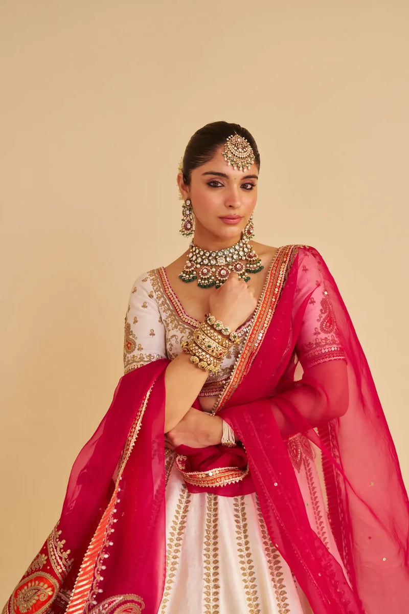 Amara - Handcrafted Pure Silk Daisy Ivory Lehenga Set silk by SHEETAL BATRA in pink color for women Worldwide