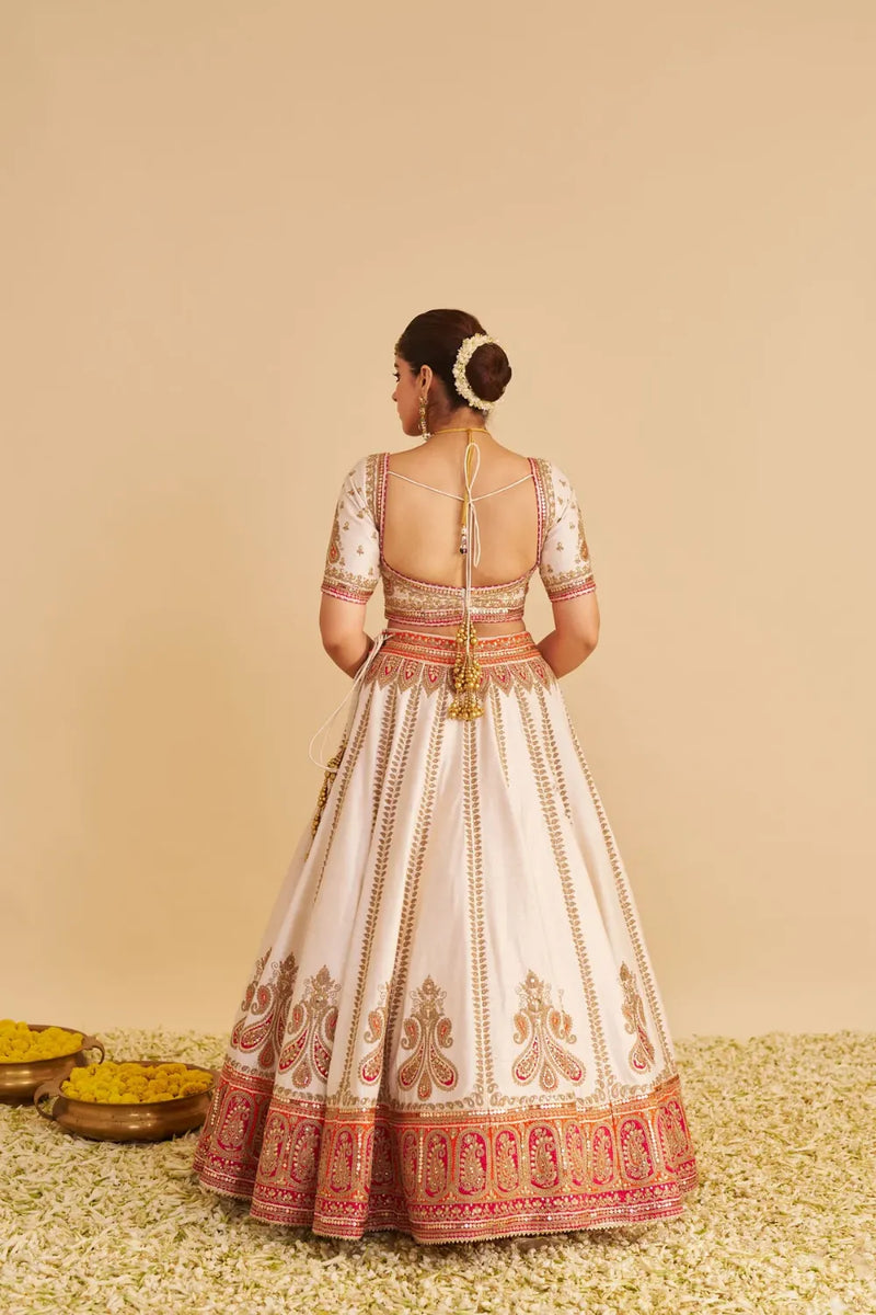 Amara - Handcrafted Pure Silk Daisy Ivory Lehenga Set silk by SHEETAL BATRA in pink color for women Worldwide