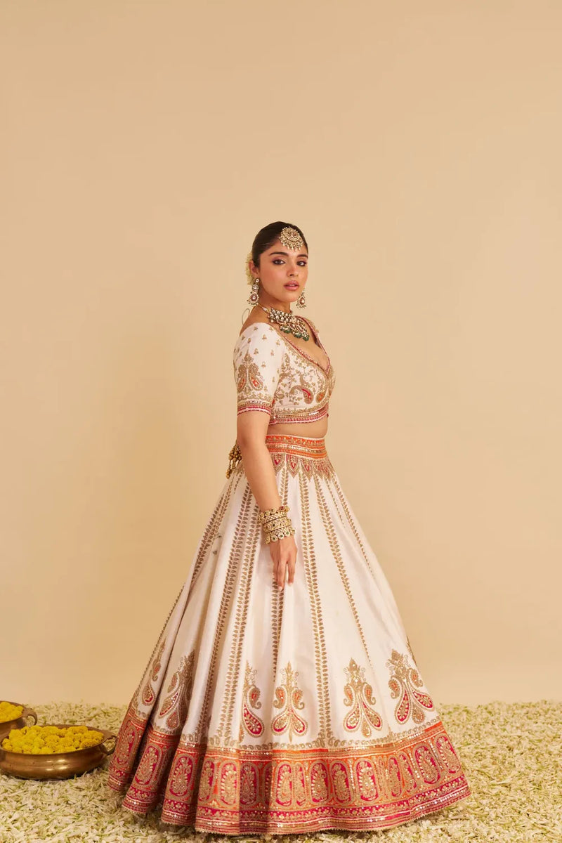 Amara - Handcrafted Pure Silk Daisy Ivory Lehenga Set silk by SHEETAL BATRA in pink color for women Worldwide