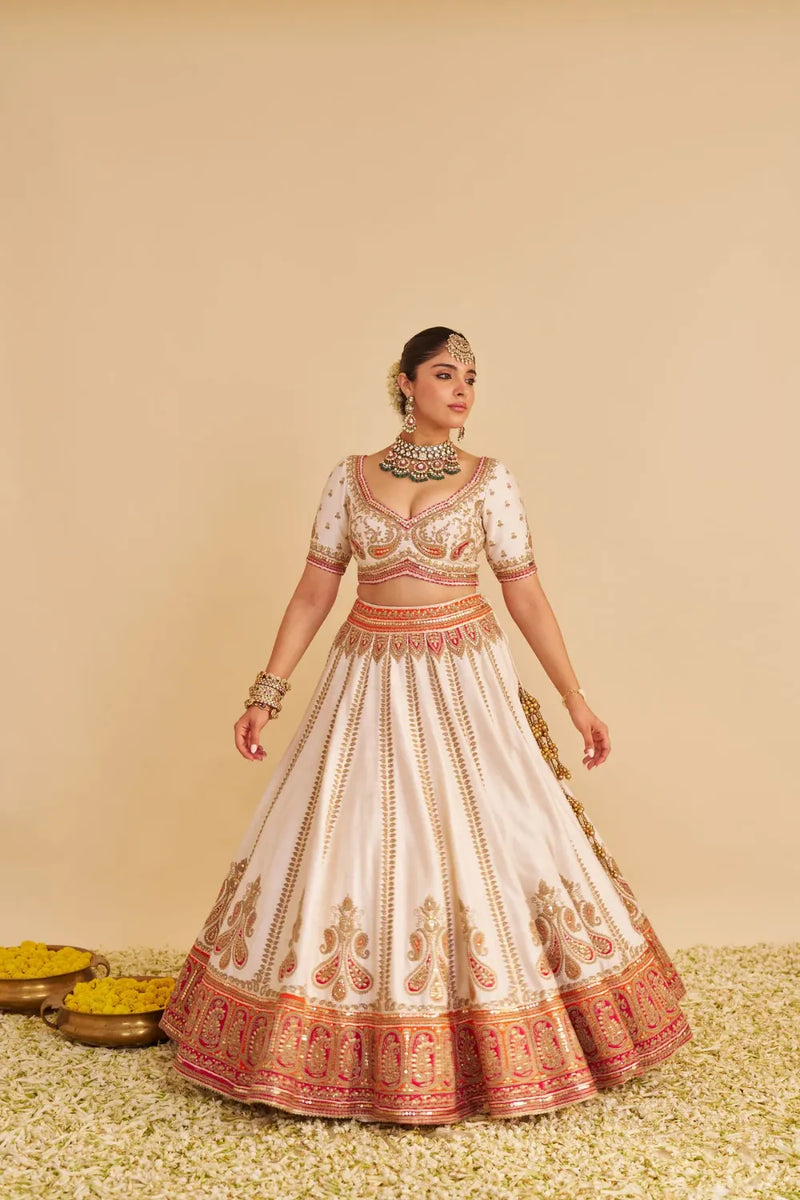 Amara - Handcrafted Pure Silk Daisy Ivory Lehenga Set silk by SHEETAL BATRA in pink color for women Worldwide