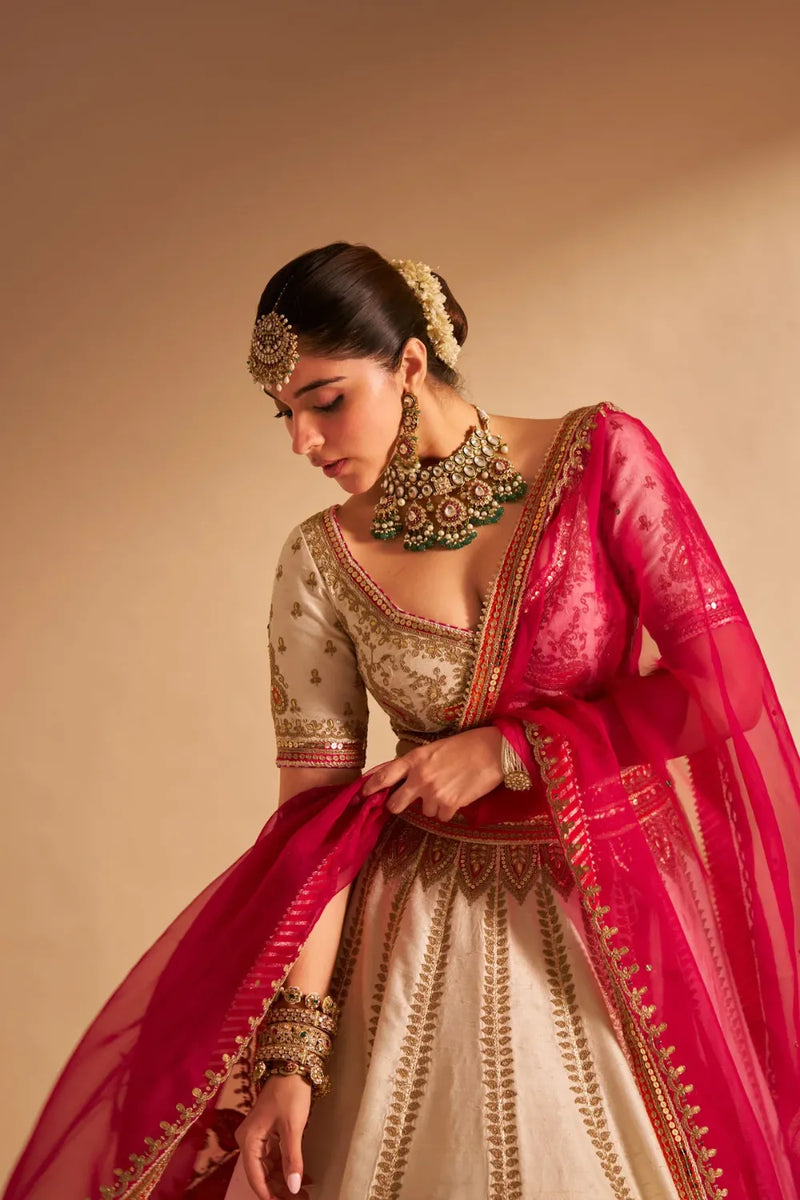 Amara - Handcrafted Pure Silk Daisy Ivory Lehenga Set silk by SHEETAL BATRA in pink color for women Worldwide