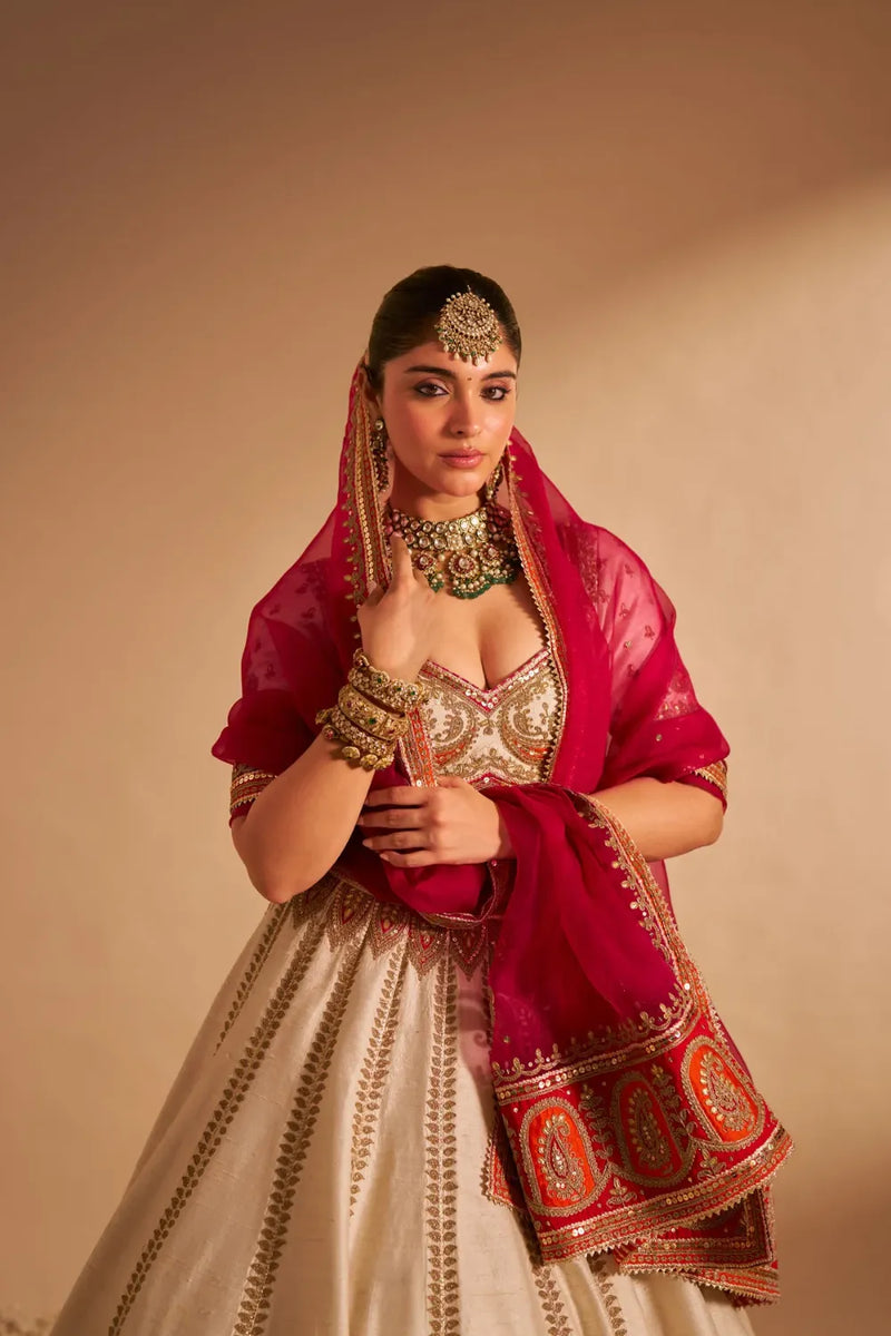 Amara - Handcrafted Pure Silk Daisy Ivory Lehenga Set silk by SHEETAL BATRA in pink color for women Worldwide