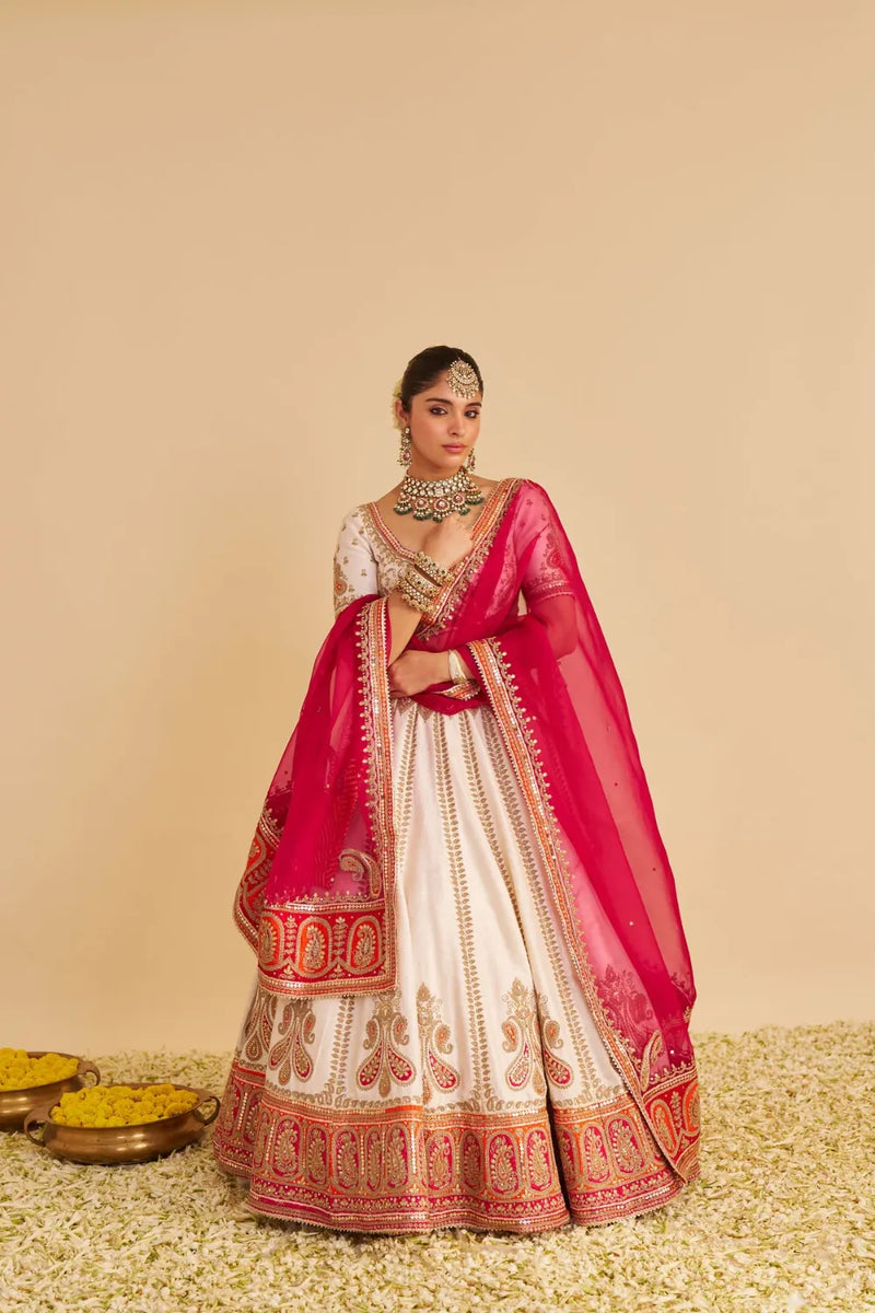 Amara - Handcrafted Pure Silk Daisy Ivory Lehenga Set silk by SHEETAL BATRA in pink color for women Worldwide