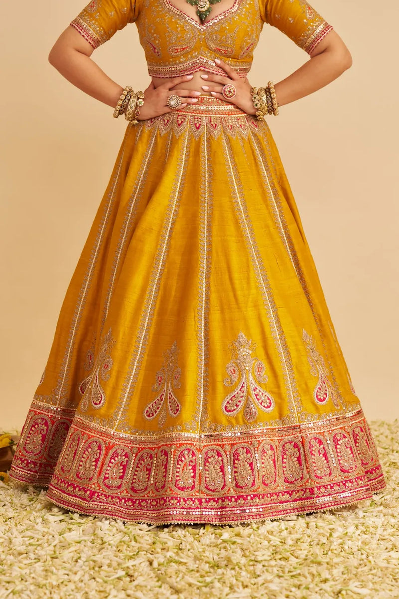 Amara - Hand Embroidered Raw Silk Mustard Bridal Lehenga Set silk by SHEETAL BATRA in mustard color for women Worldwide