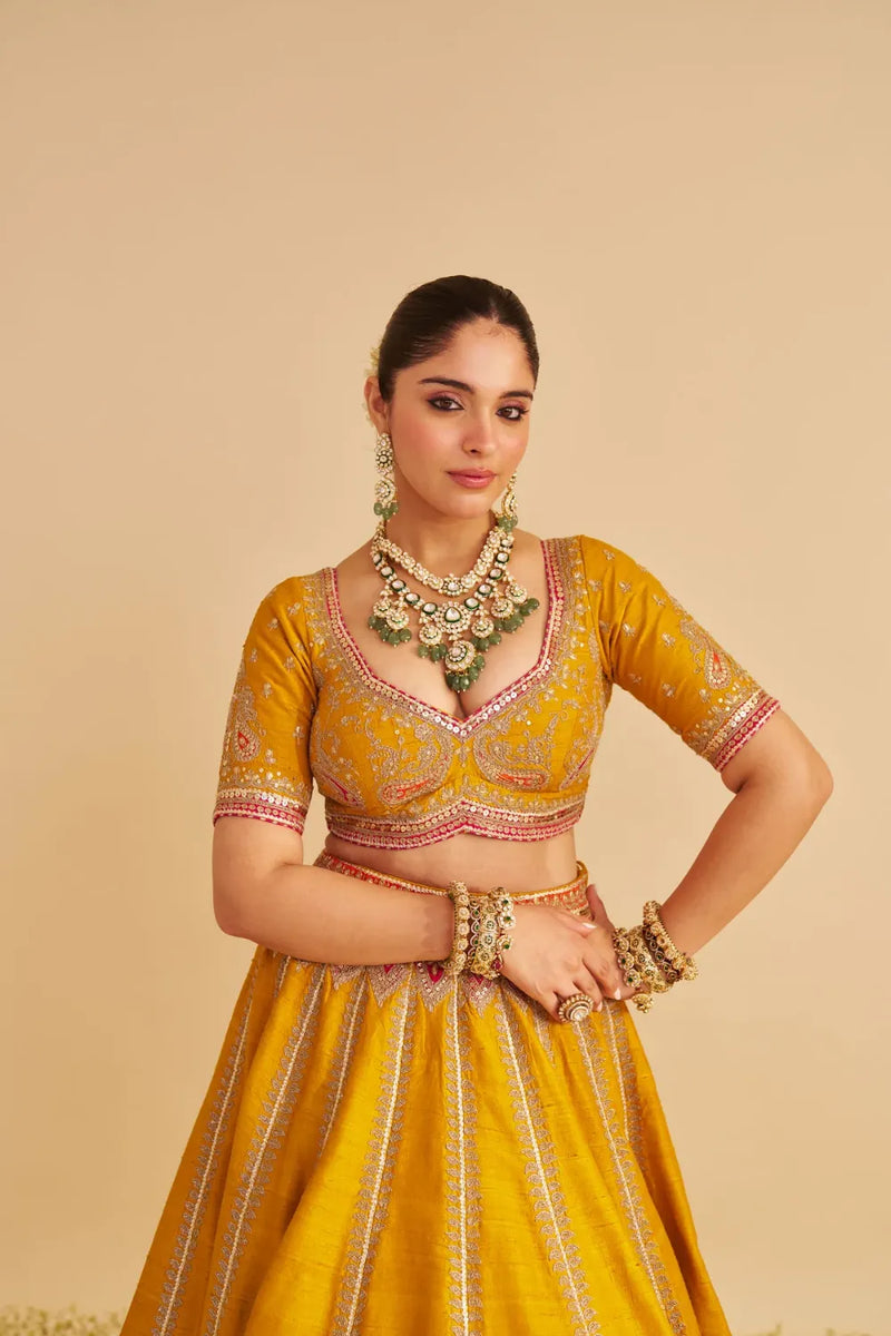 Amara - Hand Embroidered Raw Silk Mustard Bridal Lehenga Set silk by SHEETAL BATRA in mustard color for women Worldwide