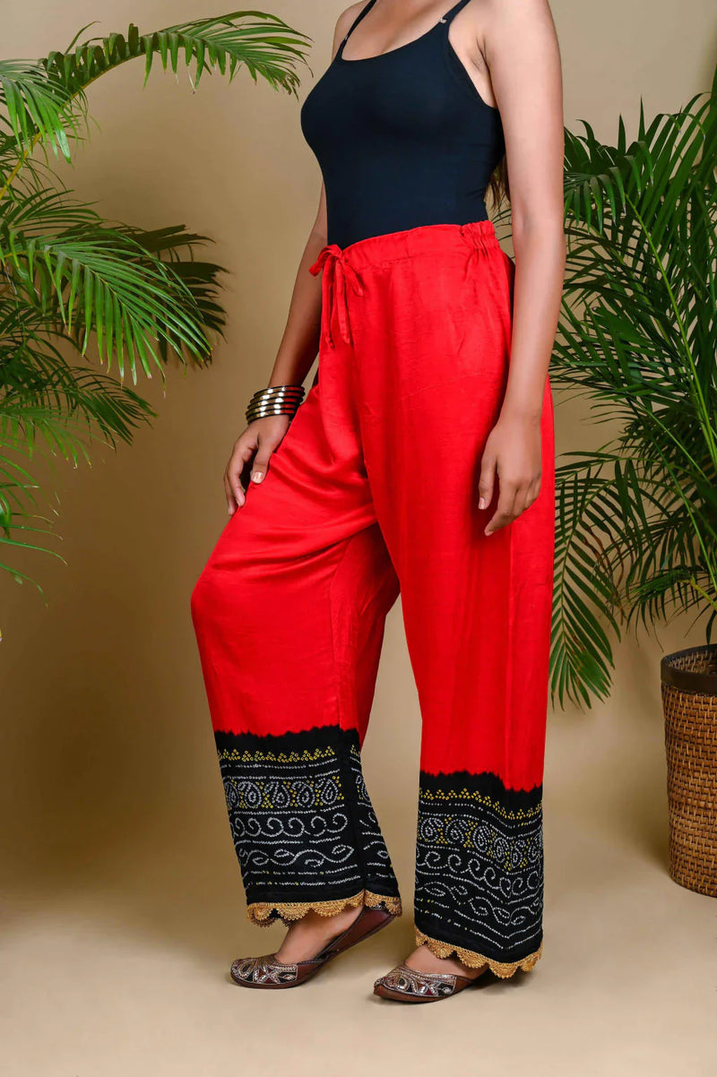 BANDHANI PANTS-BLACK & RED silk by Dyelogue in red color for women Worldwide