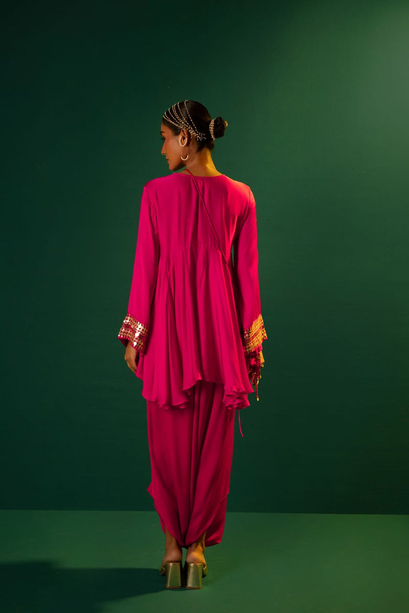 Chamakeen Ariyana Fuscia Asymmetrical Tunic with Dhoti Skirt satin by PRAHNAAYA in pink color for women Worldwide