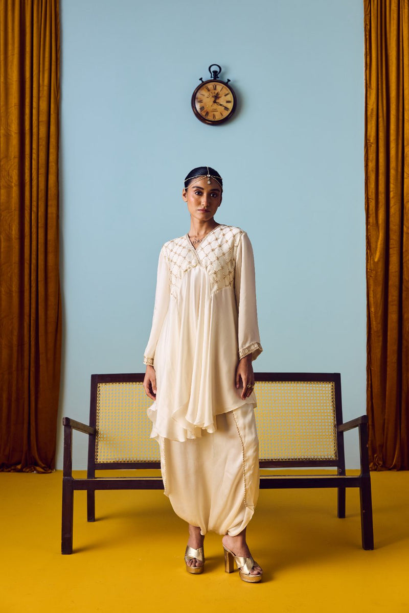 Sureen Pearl Asymmetric Flared Top & Skirt Set satin by PRAHNAAYA in white color for women Worldwide