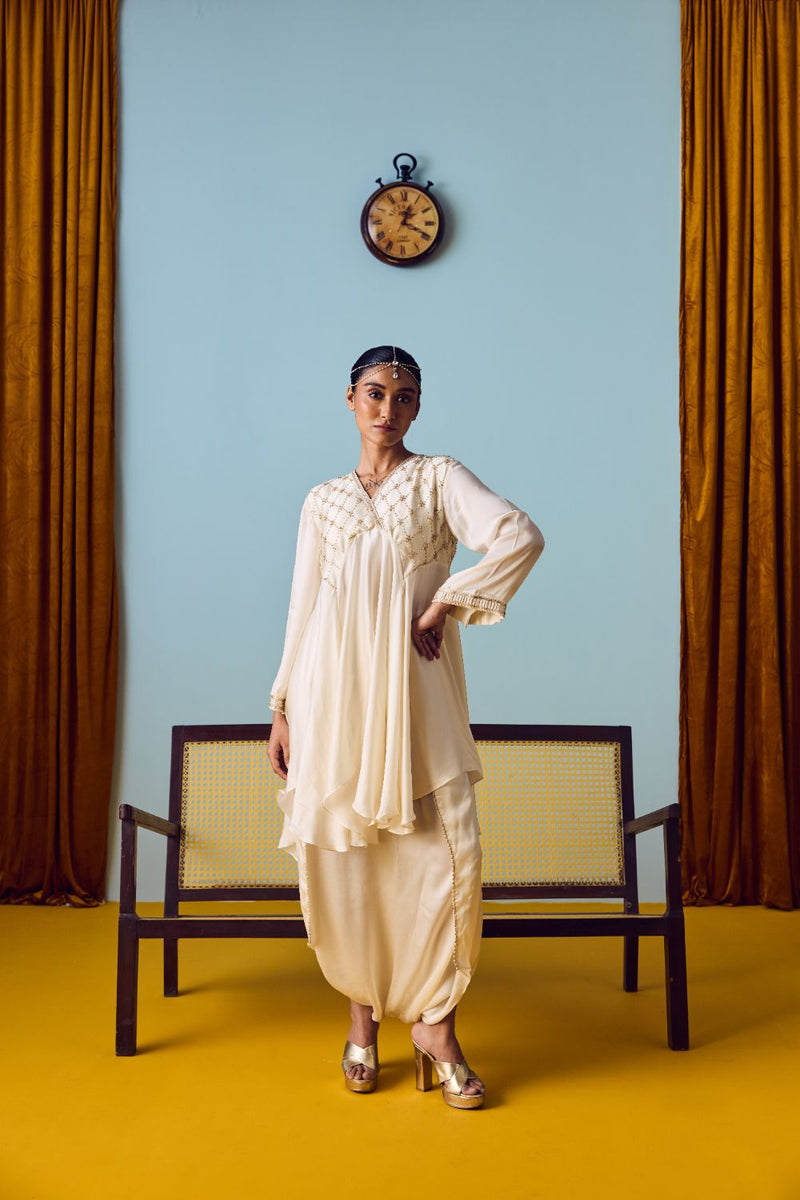 Sureen Pearl Asymmetric Flared Top & Skirt Set satin by PRAHNAAYA in white color for women Worldwide