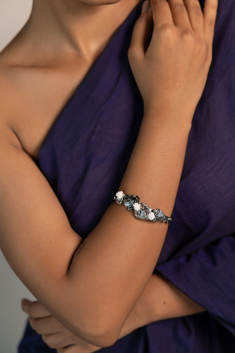 Pushpi kada 18k gold plated on brass bangle and bracelet by Aarjavee in gold for women Worldwide