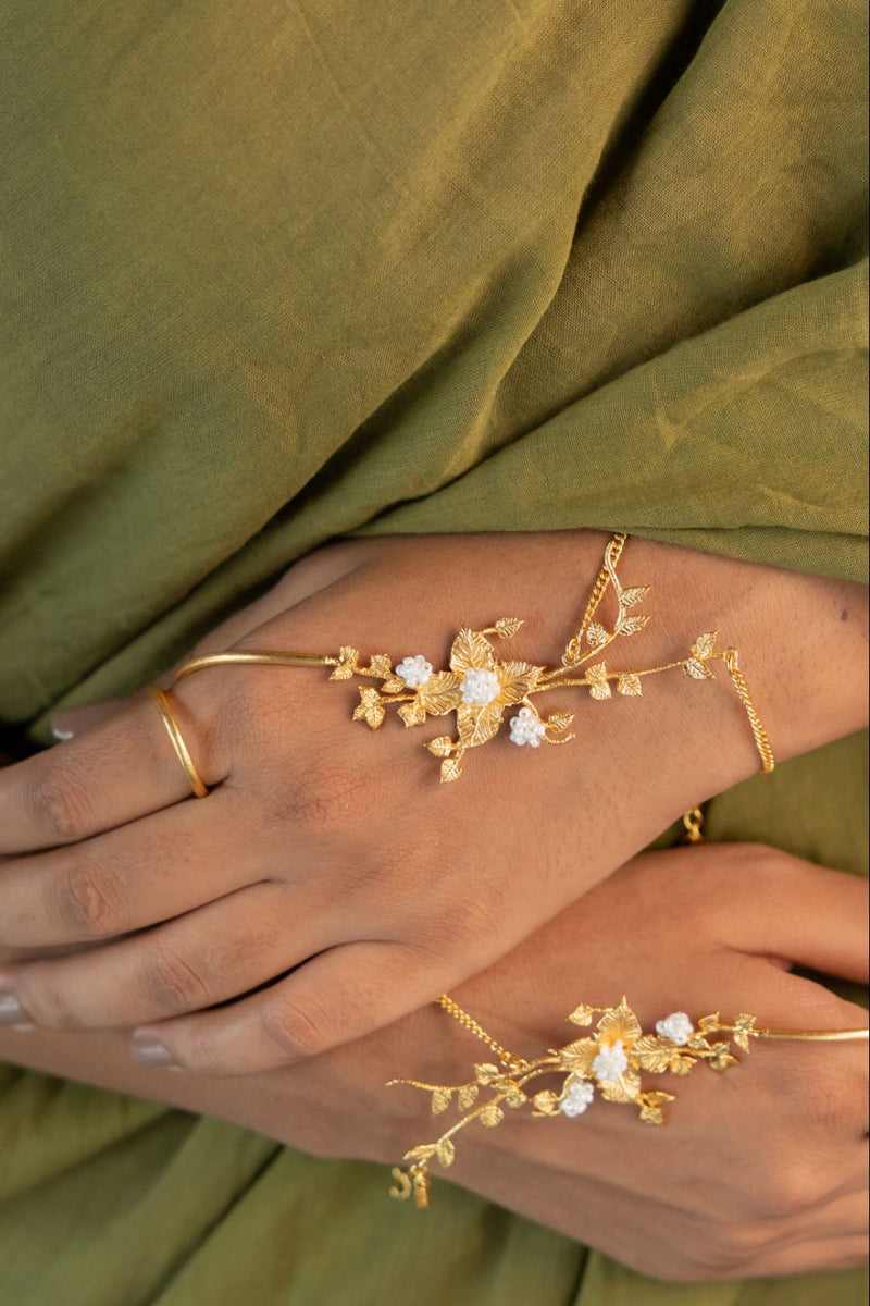 Chhayaa Harness 18k gold plated on brass bangle and bracelet by Aarjavee in gold for women Worldwide