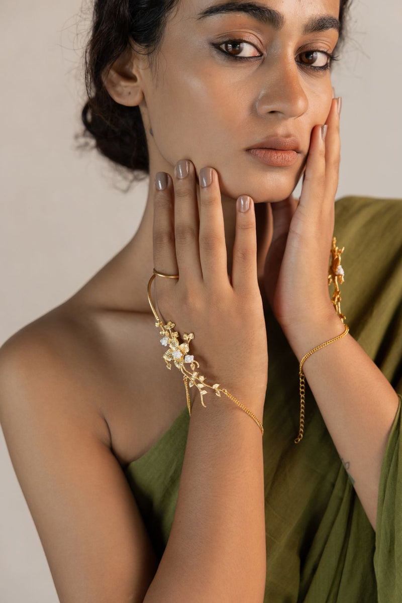 Chhayaa Harness 18k gold plated on brass bangle and bracelet by Aarjavee in gold for women Worldwide