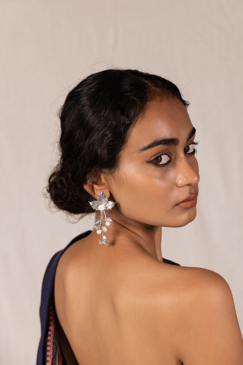 Chhayaa Butti 18k gold plated on brass earring by Aarjavee in gold for women Worldwide