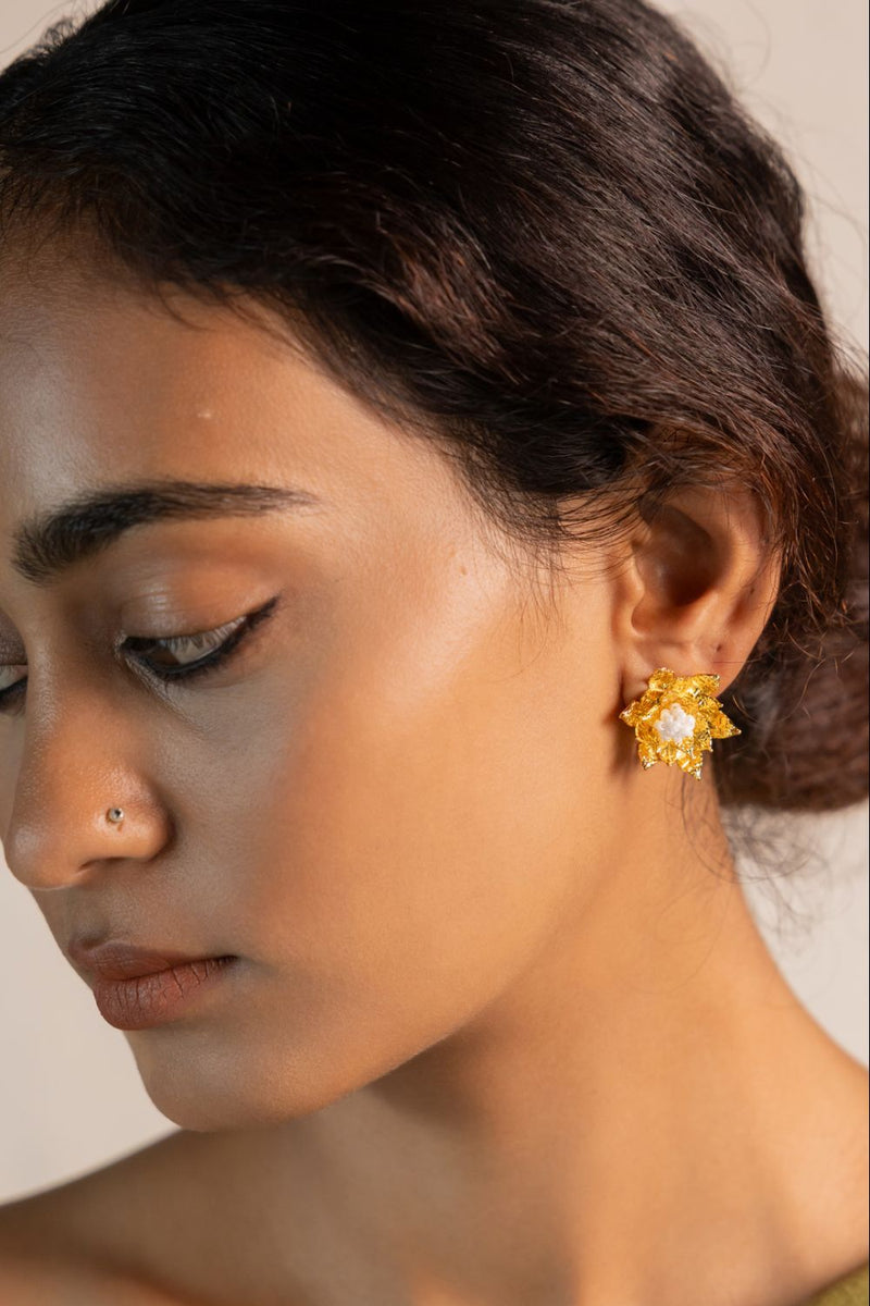 Pushpi 18k gold plated on brass earring by Aarjavee in gold for women Worldwide