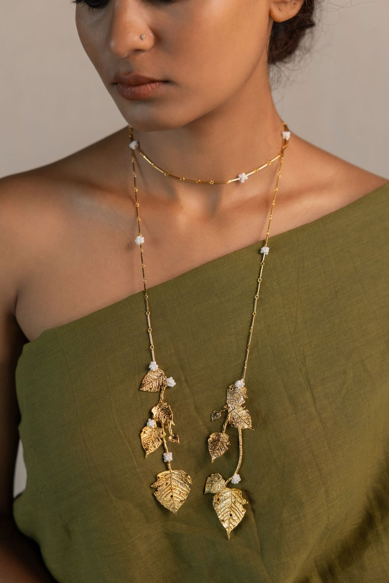 Megh Lariat 18k gold plated on brass neckpiece by Aarjavee in gold for women Worldwide