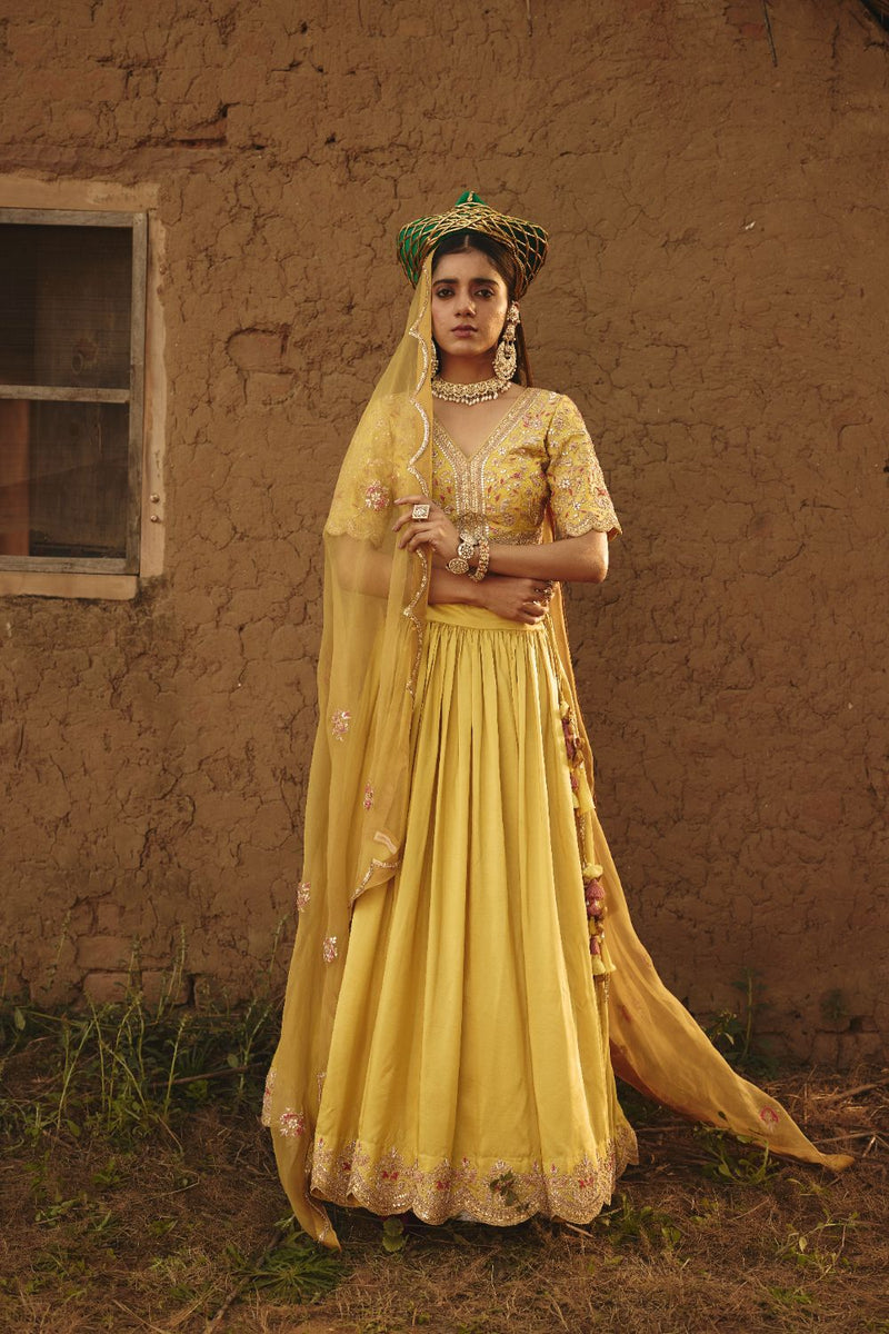 DRITI & HESYRA BLOUSE & LEHENGA silk by Rashika Mittal in yellow color for women Worldwide