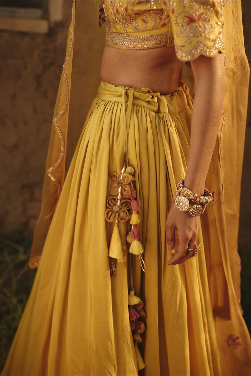 DRITI & HESYRA BLOUSE & LEHENGA silk by Rashika Mittal in yellow color for women Worldwide