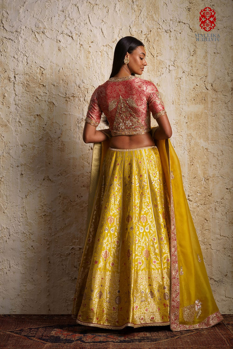 Shaheen Basanti yellow silk brocade lehenga silk by Mallika Mathur in yellow color for women Worldwide