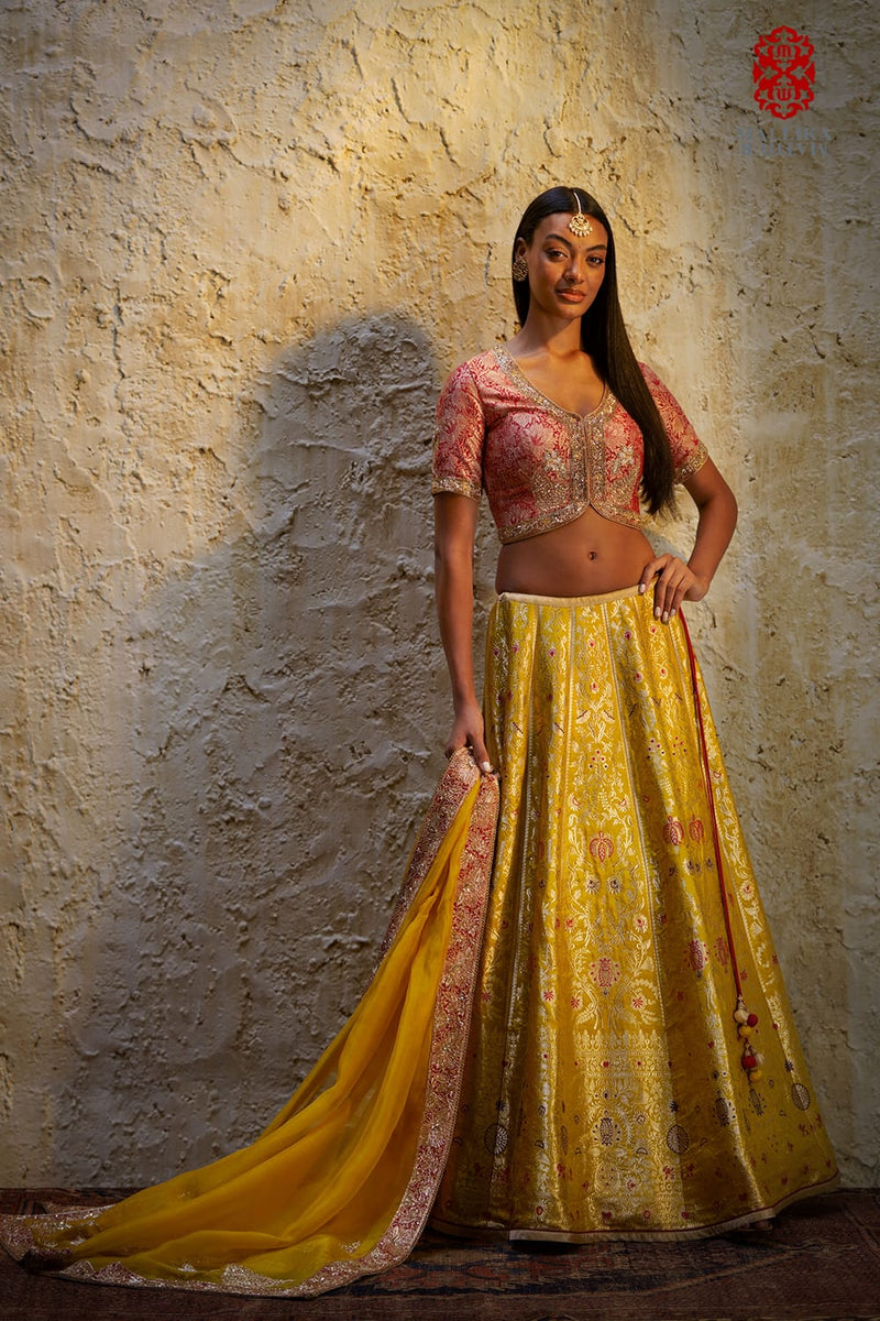 Shaheen Basanti yellow silk brocade lehenga silk by Mallika Mathur in yellow color for women Worldwide