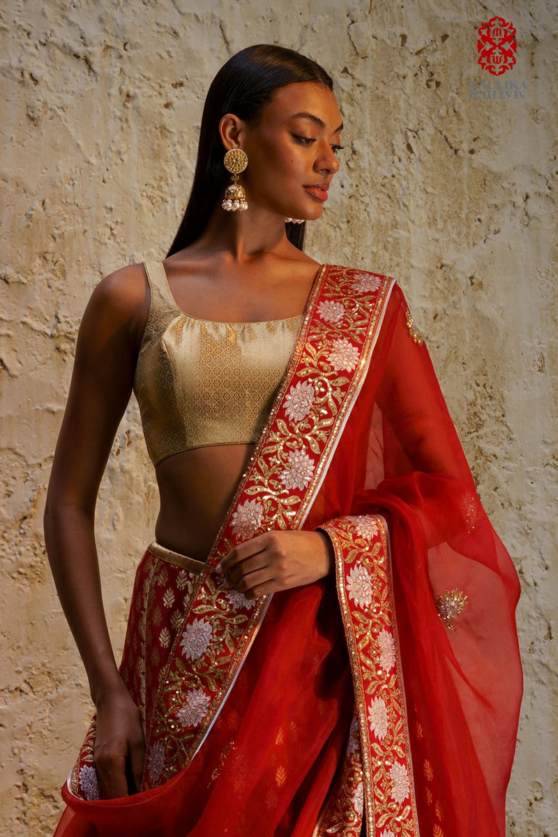 Sitara blouse sleeveless gold zari by Mallika Mathur in gold color for women Worldwide