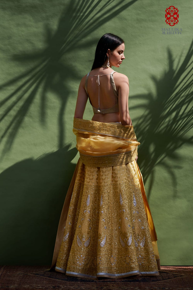 Mehak silk georgette lehenga-butter yellow silk by Mallika Mathur in yellow color for women Worldwide
