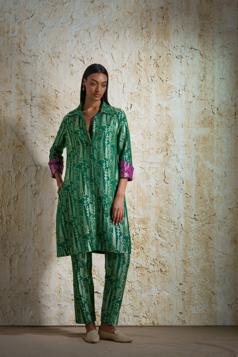 Vriksha collared tunic and slim pants in munga silk-emerald green silk by Mallika Mathur in green color for women Worldwide