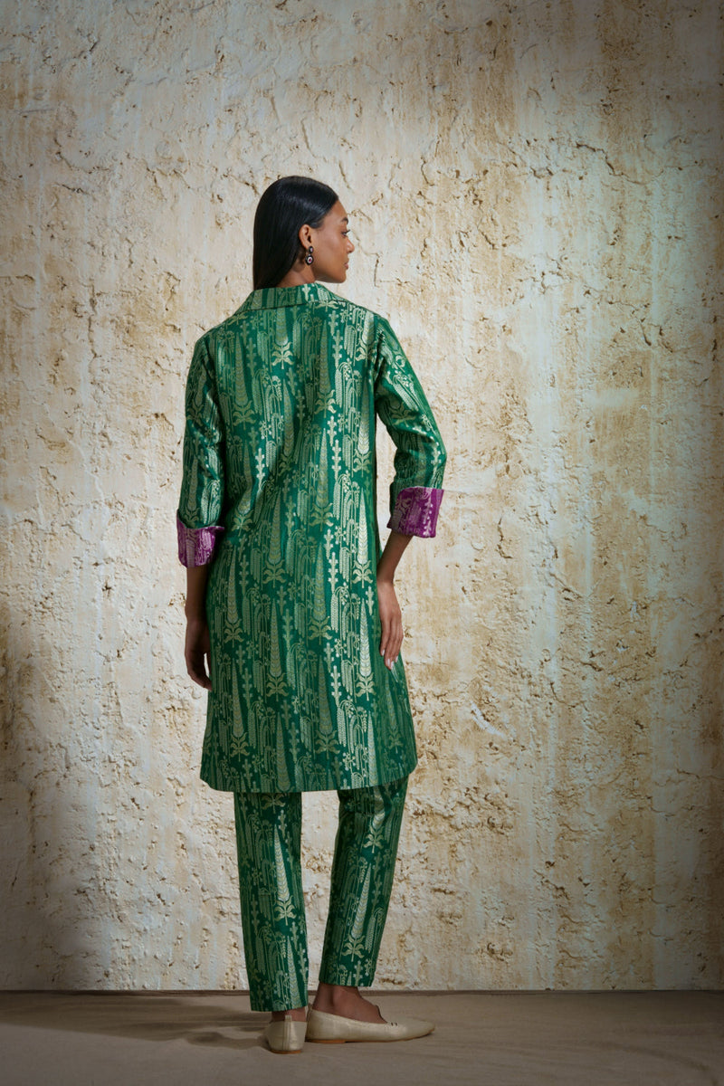 Vriksha collared tunic and slim pants in munga silk-emerald green silk by Mallika Mathur in green color for women Worldwide