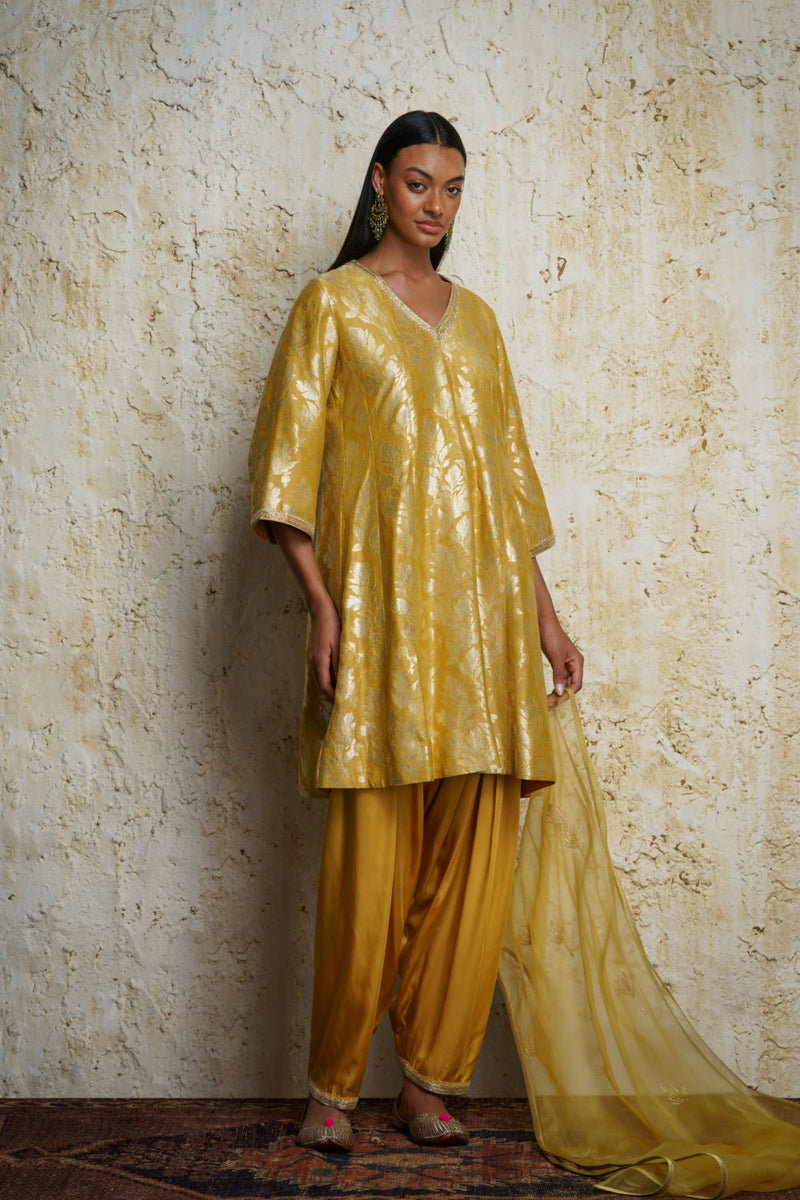 Amrasi munga silk kalidar tunic silk by Mallika Mathur in yellow color for women Worldwide