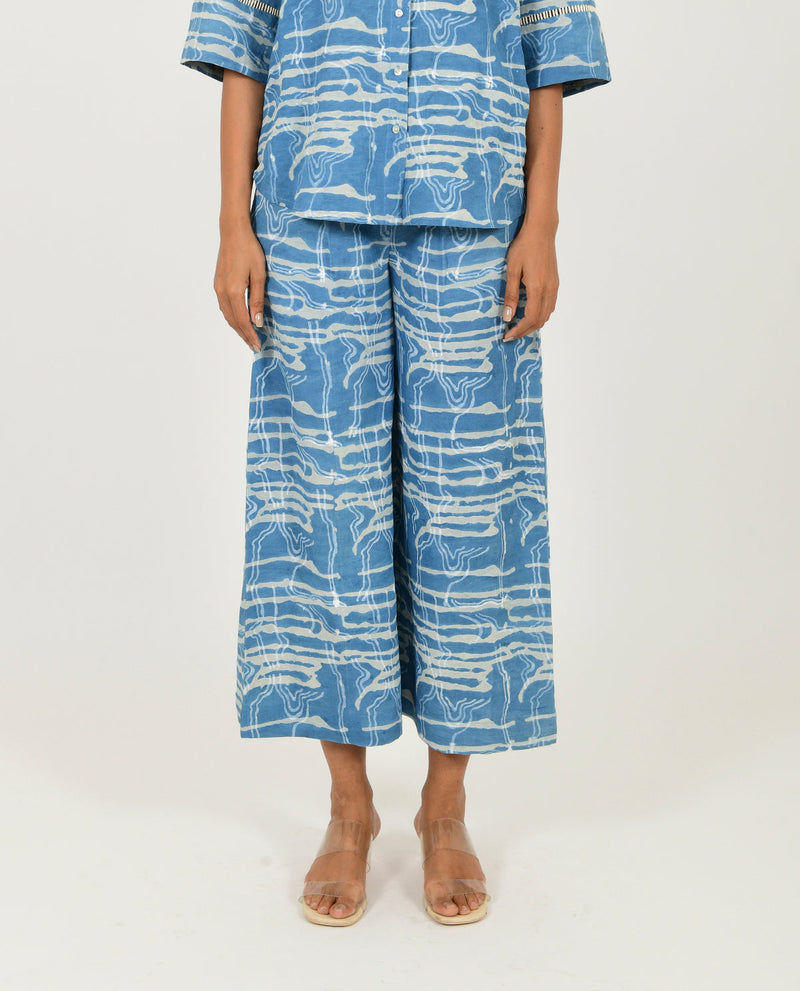 INDIGO SPLASH LINEN PANTS by Rias in blue color for women Worldwide