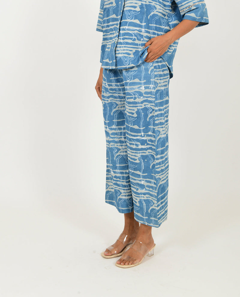 INDIGO SPLASH LINEN PANTS by Rias in blue color for women Worldwide