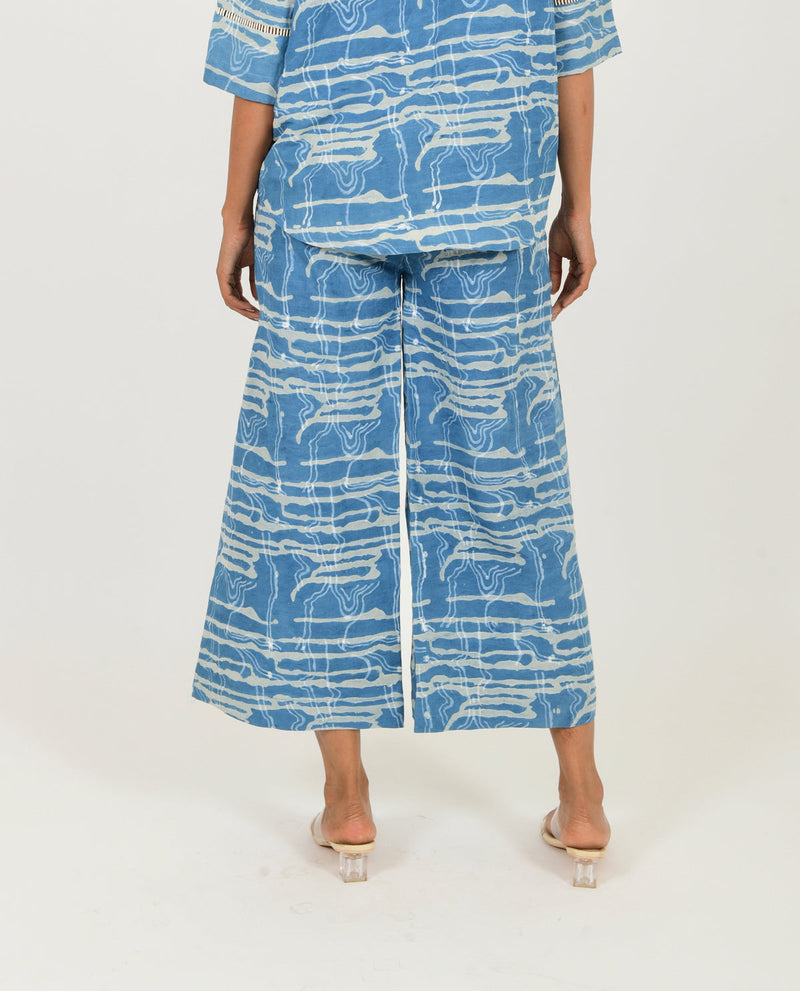 INDIGO SPLASH LINEN PANTS by Rias in blue color for women Worldwide