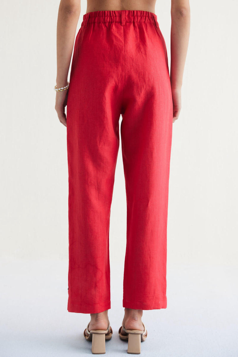 Ebb & Flow Sunset Linen Trousers by SUI in red color for women Worldwide