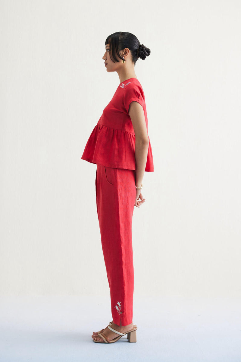 Ebb & Flow Sunset Linen Trousers by SUI in red color for women Worldwide