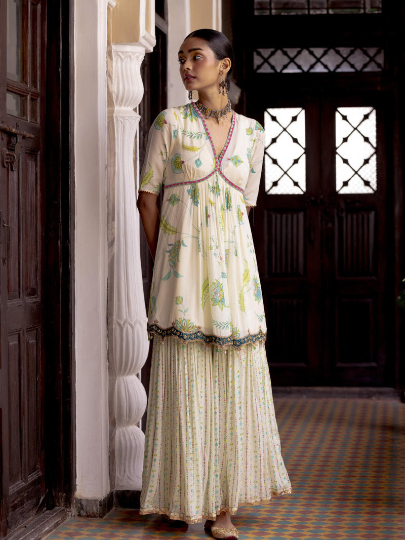 Fariba Ivory Printed Scallop Gharara Set Kurta Sets by Rajiramniq for women Worldwide