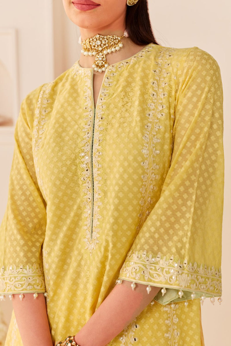 FIRDAUS -LEMON YELLOW LONG KALIDAAR CHAUGA WITH DOGRI SALWAR AND DUPATTA chanderi silk kurta/kurta set by SHEETAL BATRA in lemon yellow with mint green for women Worldwide