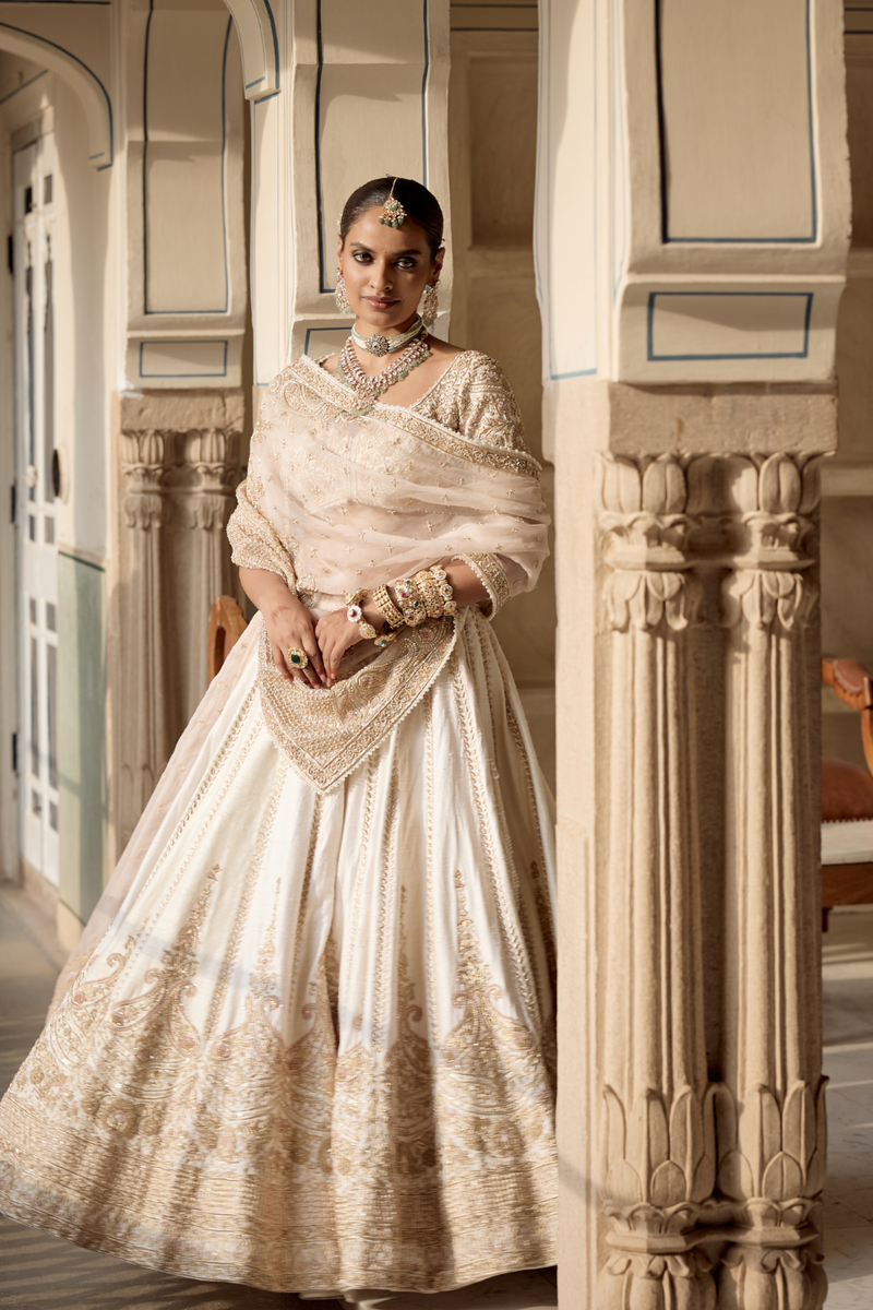 Farah - Dabka Zardozi Embroidered Pure Silk Daisy Ivory Lehenga Set silk by SHEETAL BATRA in blush color for women Worldwide
