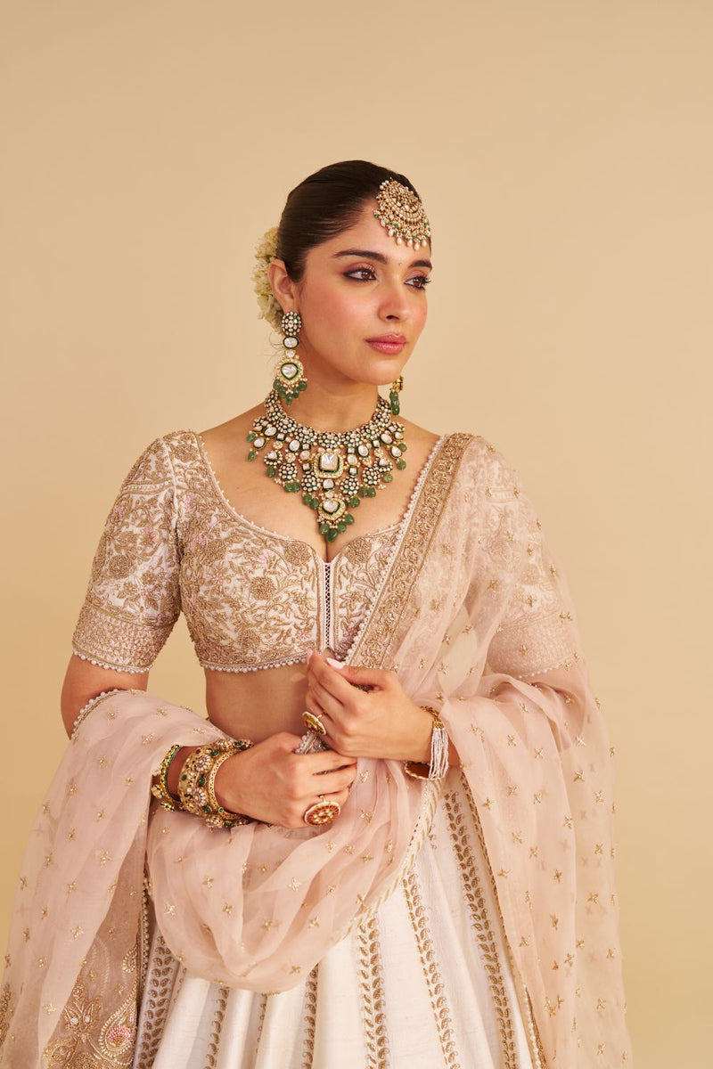 Farah - Dabka Zardozi Embroidered Pure Silk Daisy Ivory Lehenga Set silk by SHEETAL BATRA in blush color for women Worldwide