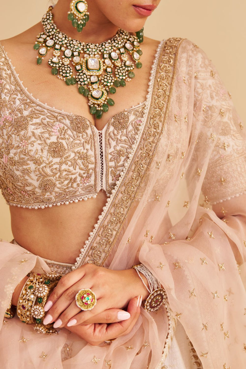 Farah - Dabka Zardozi Embroidered Pure Silk Daisy Ivory Lehenga Set silk by SHEETAL BATRA in blush color for women Worldwide