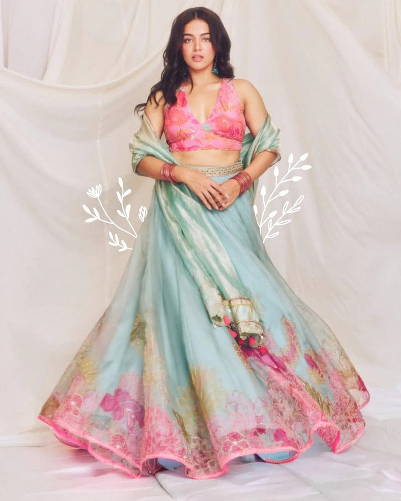 Wamiqa Gabbi Ice Blue Floral Organza Lehenga Set organza , crepe, tissue organza by Rajiramniq in ice blue for women Worldwide