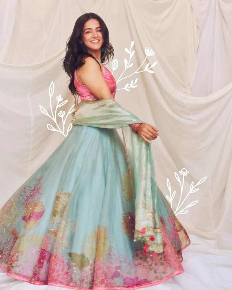 Wamiqa Gabbi Ice Blue Floral Organza Lehenga Set organza , crepe, tissue organza by Rajiramniq in ice blue for women Worldwide