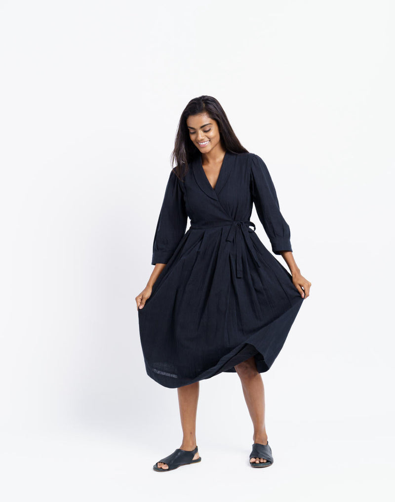 Iconic wrap - around midi dress - Black Dress by World of Crow in black color for women Worldwide
