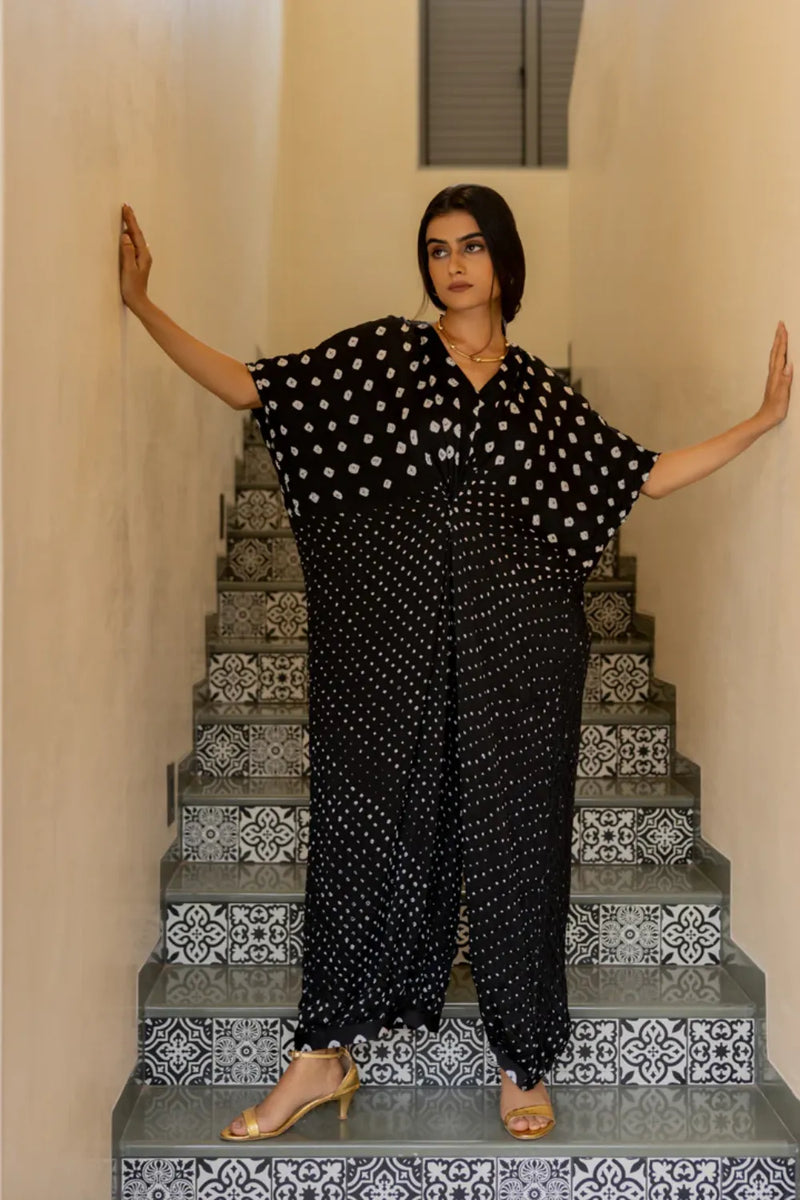 KNOT JUMPSUIT-BLACK silk by Dyelogue in black color for women Worldwide